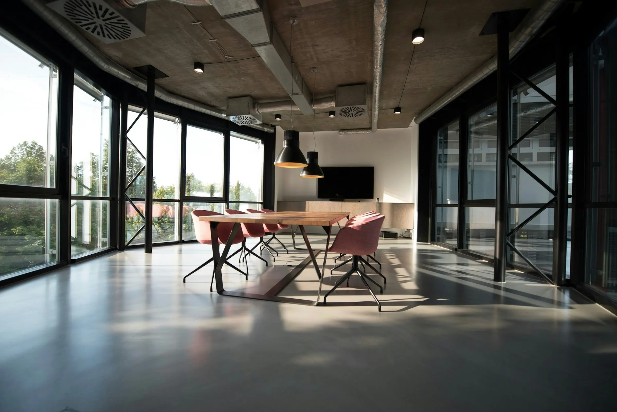 A glass-walled meeting room