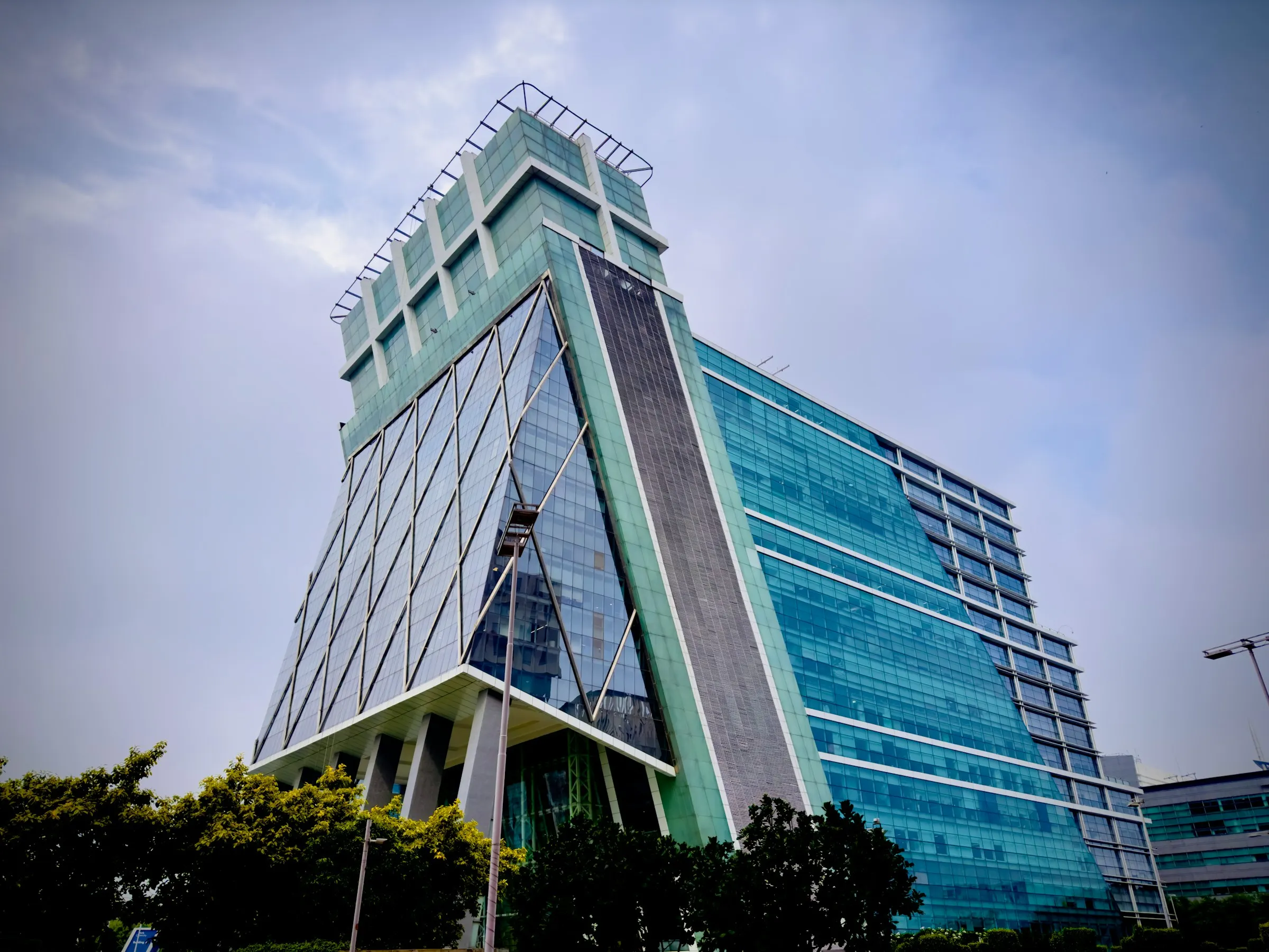 A glass office tower in Gurugram